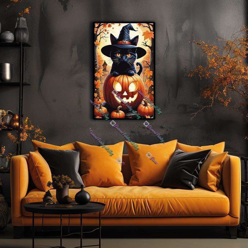 Black cat with pumpkin toy